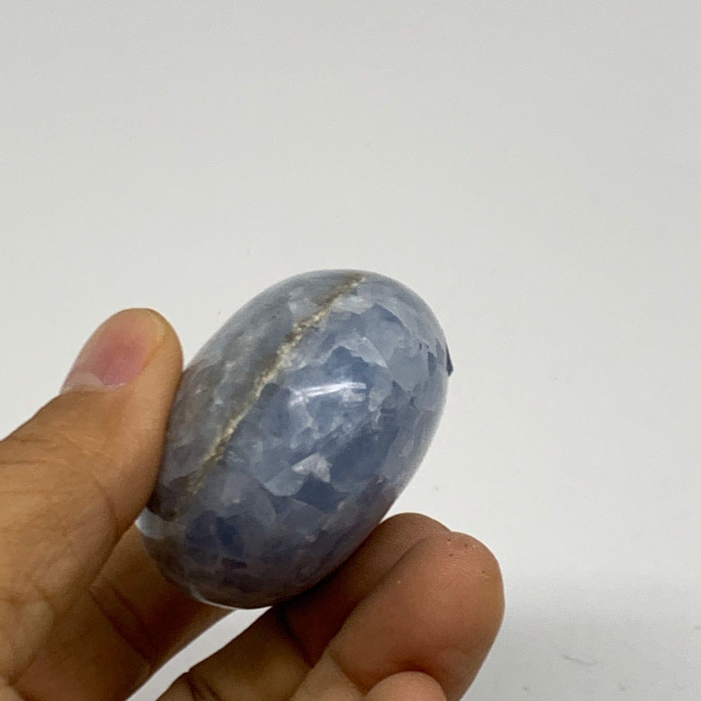 131.8g, 2.5"x1.7"x1.2" Blue Calcite Palm-Stone Polished Tumbled, B38109