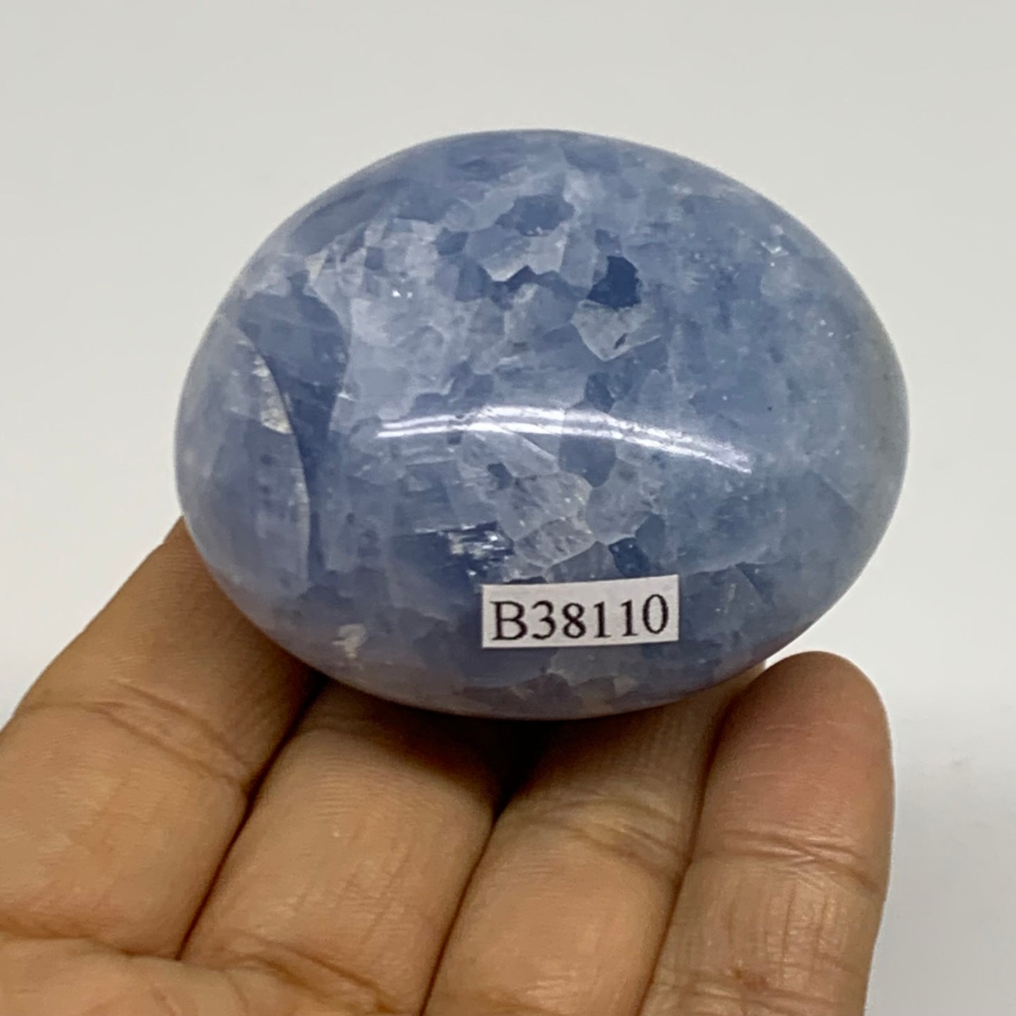128.1g, 2.2"x1.9"x1.3" Blue Calcite Palm-Stone Polished Tumbled, B38110