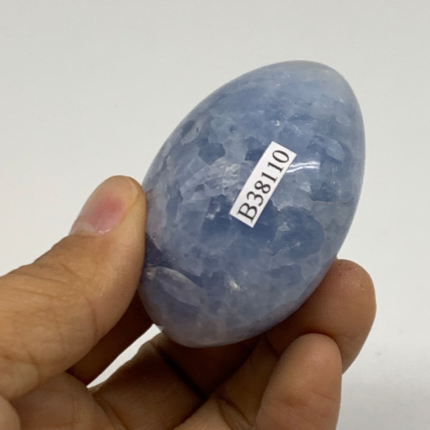 128.1g, 2.2"x1.9"x1.3" Blue Calcite Palm-Stone Polished Tumbled, B38110