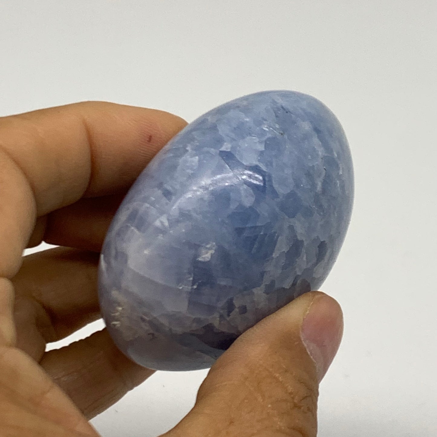 128.1g, 2.2"x1.9"x1.3" Blue Calcite Palm-Stone Polished Tumbled, B38110