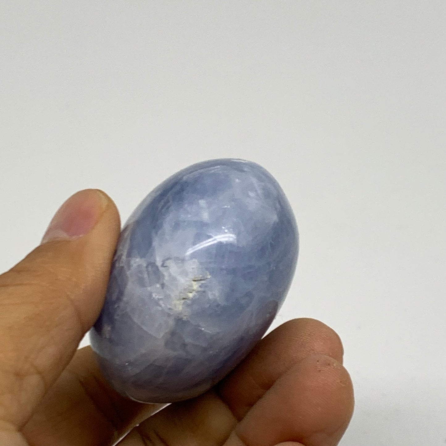 128.1g, 2.2"x1.9"x1.3" Blue Calcite Palm-Stone Polished Tumbled, B38110
