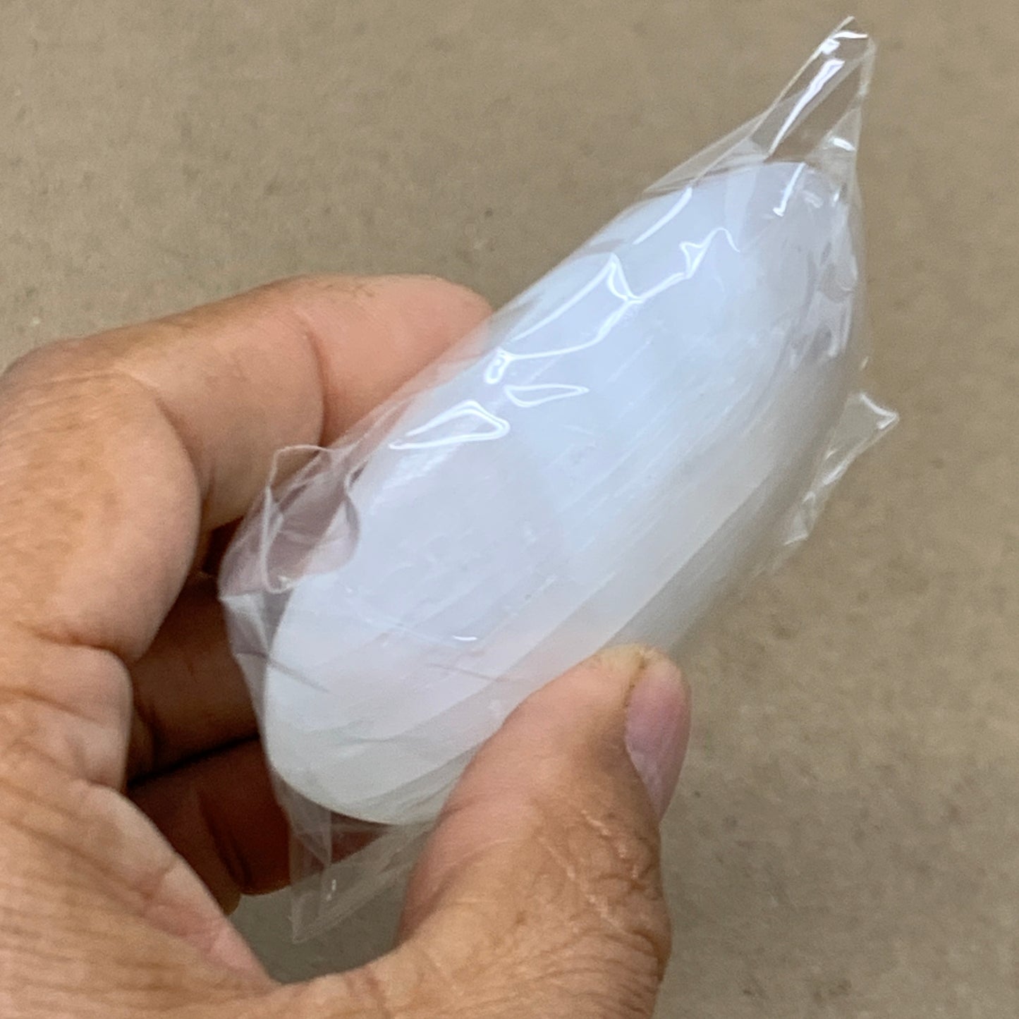 94g, 2.7"x1.9"x0.9", White Selenite Palmstone Crystal Pillow Reiki, B36358