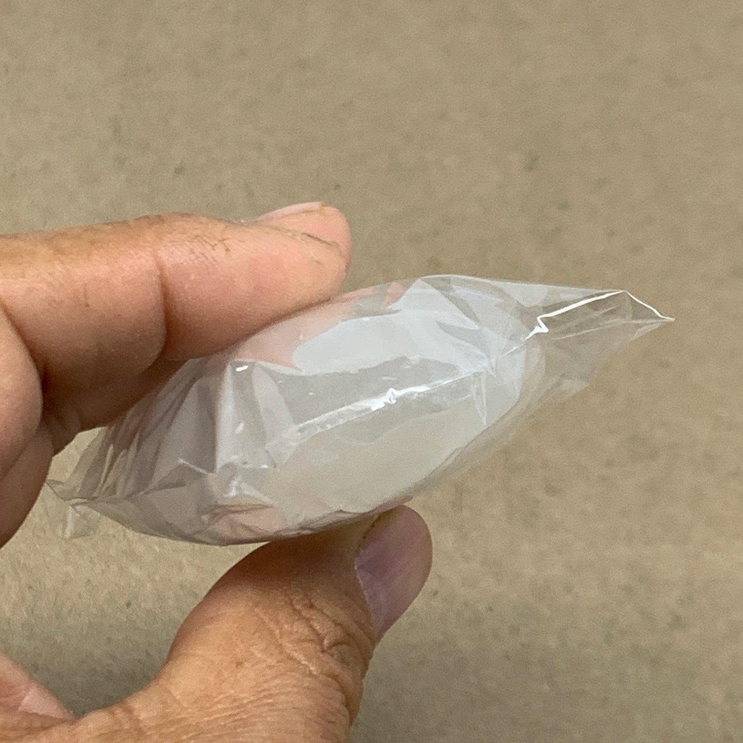 94g, 2.7"x1.9"x0.9", White Selenite Palmstone Crystal Pillow Reiki, B36358