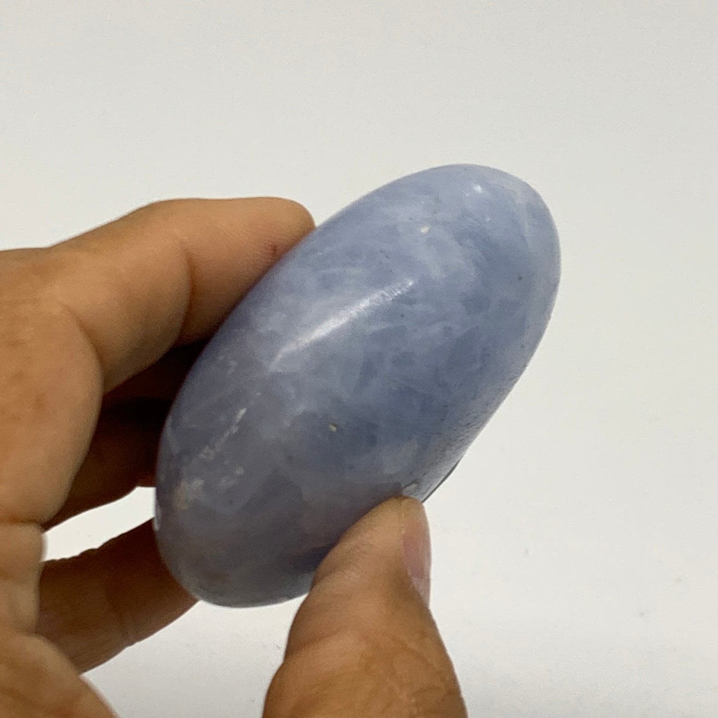 124.5g, 2.3"x2.1"x1" Blue Calcite Palm-Stone Polished Tumbled, B38111