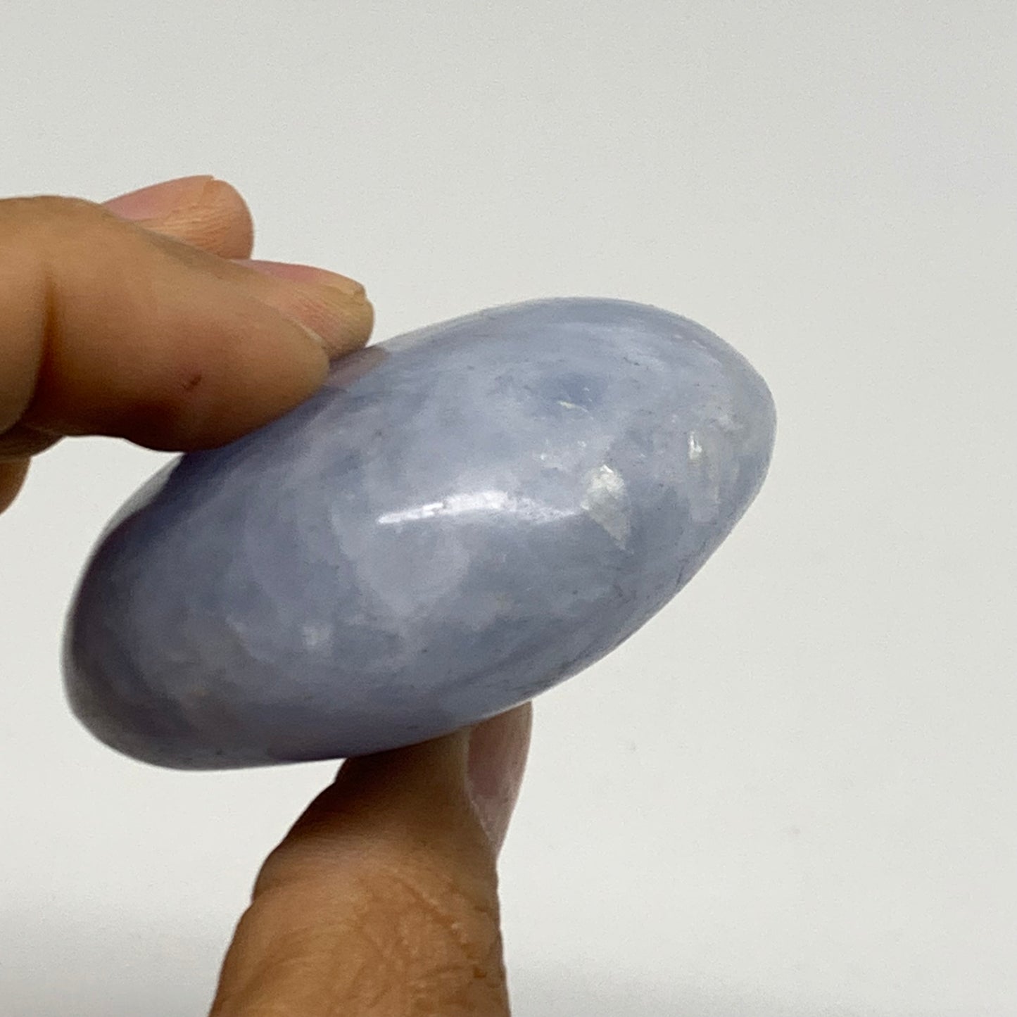 124.5g, 2.3"x2.1"x1" Blue Calcite Palm-Stone Polished Tumbled, B38111