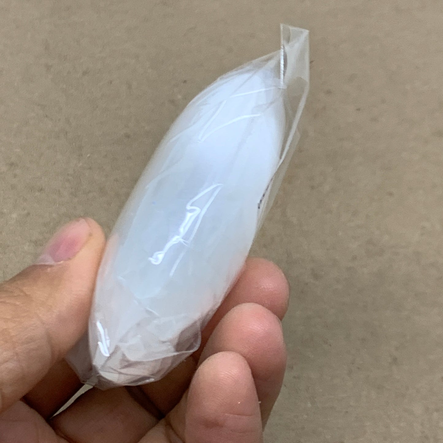 97g, 2.7"x1.9"x1", White Selenite Palmstone Crystal Pillow Reiki, B36359