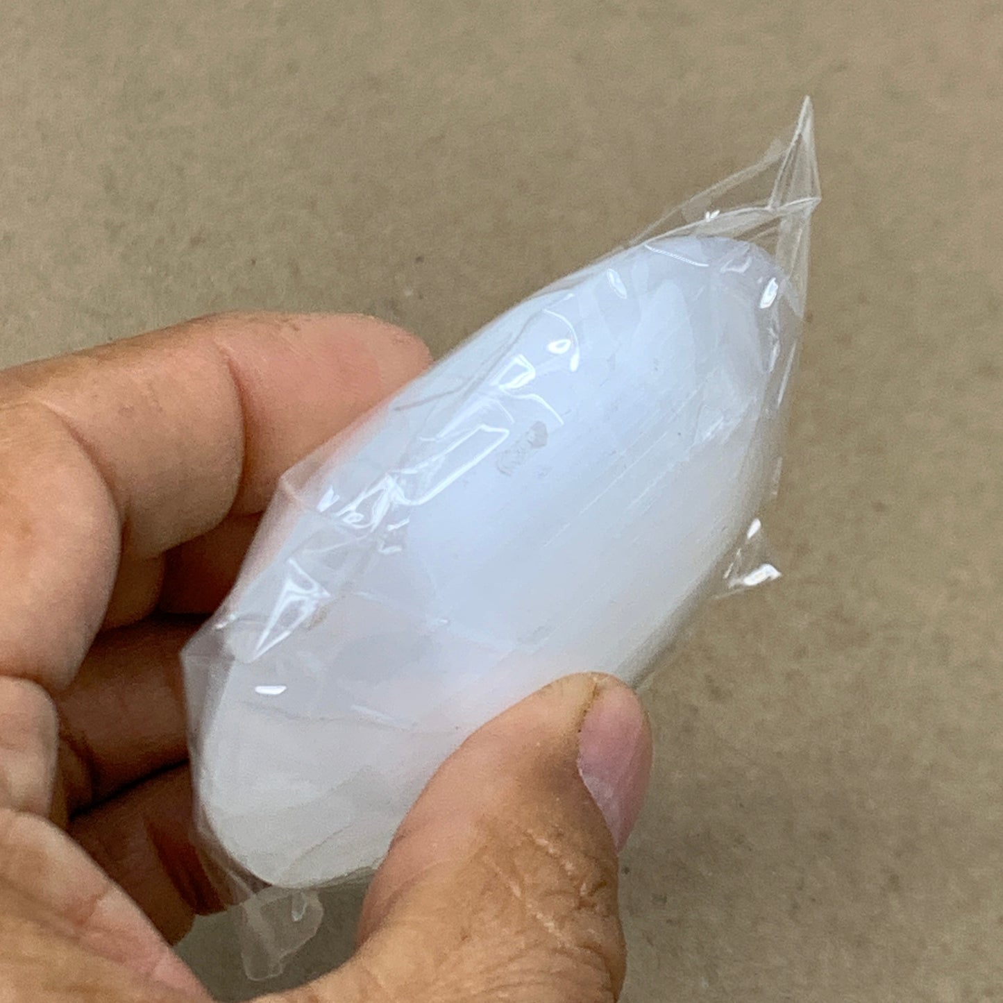 97g, 2.7"x1.9"x1", White Selenite Palmstone Crystal Pillow Reiki, B36359