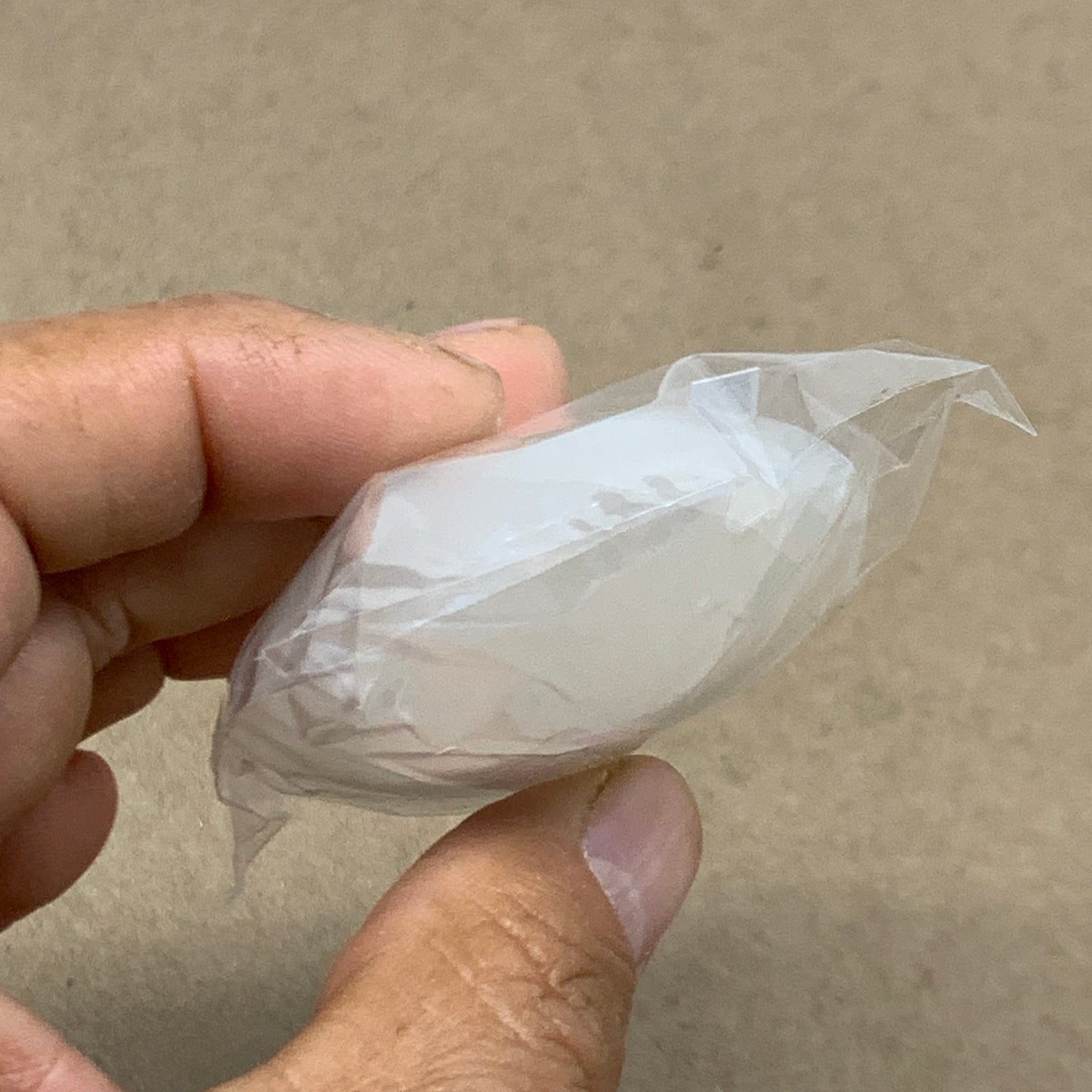 97g, 2.7"x1.9"x1", White Selenite Palmstone Crystal Pillow Reiki, B36359