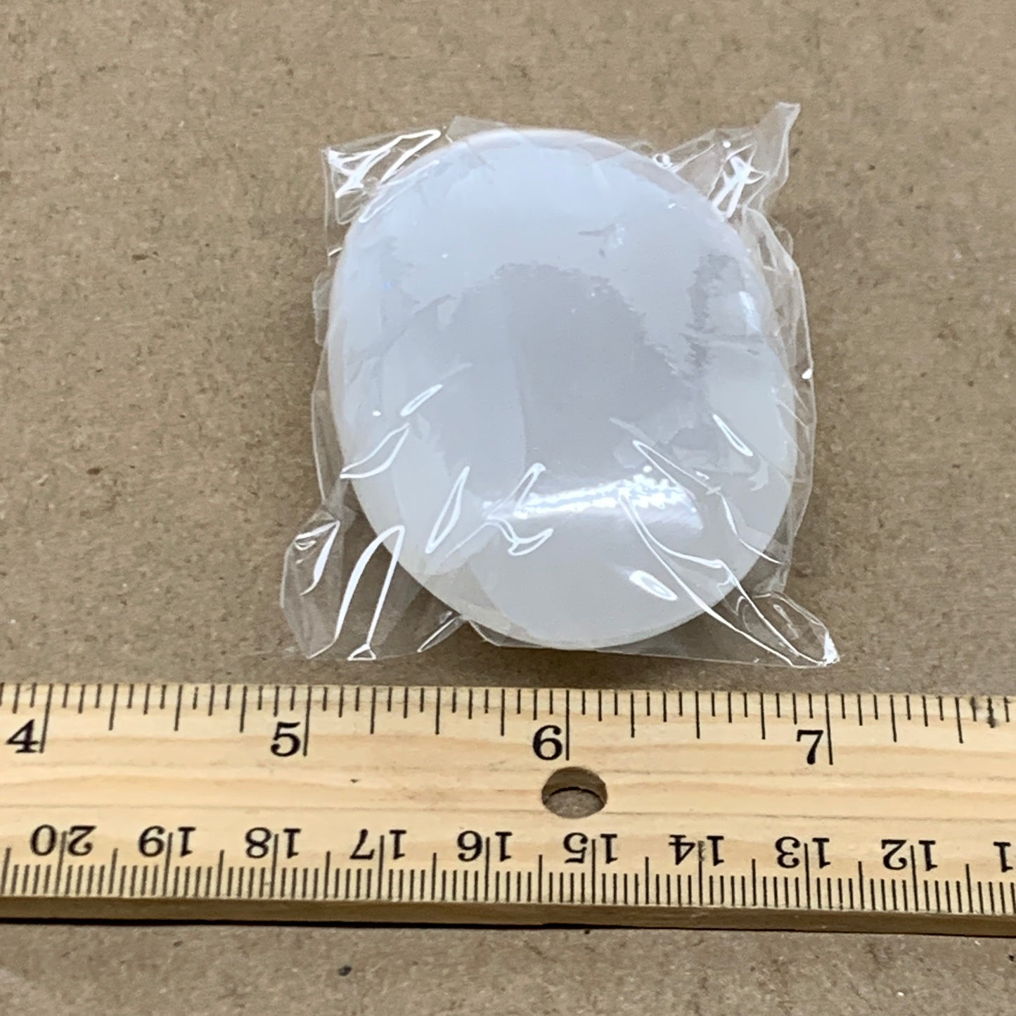 97g, 2.7"x1.9"x1", White Selenite Palmstone Crystal Pillow Reiki, B36359