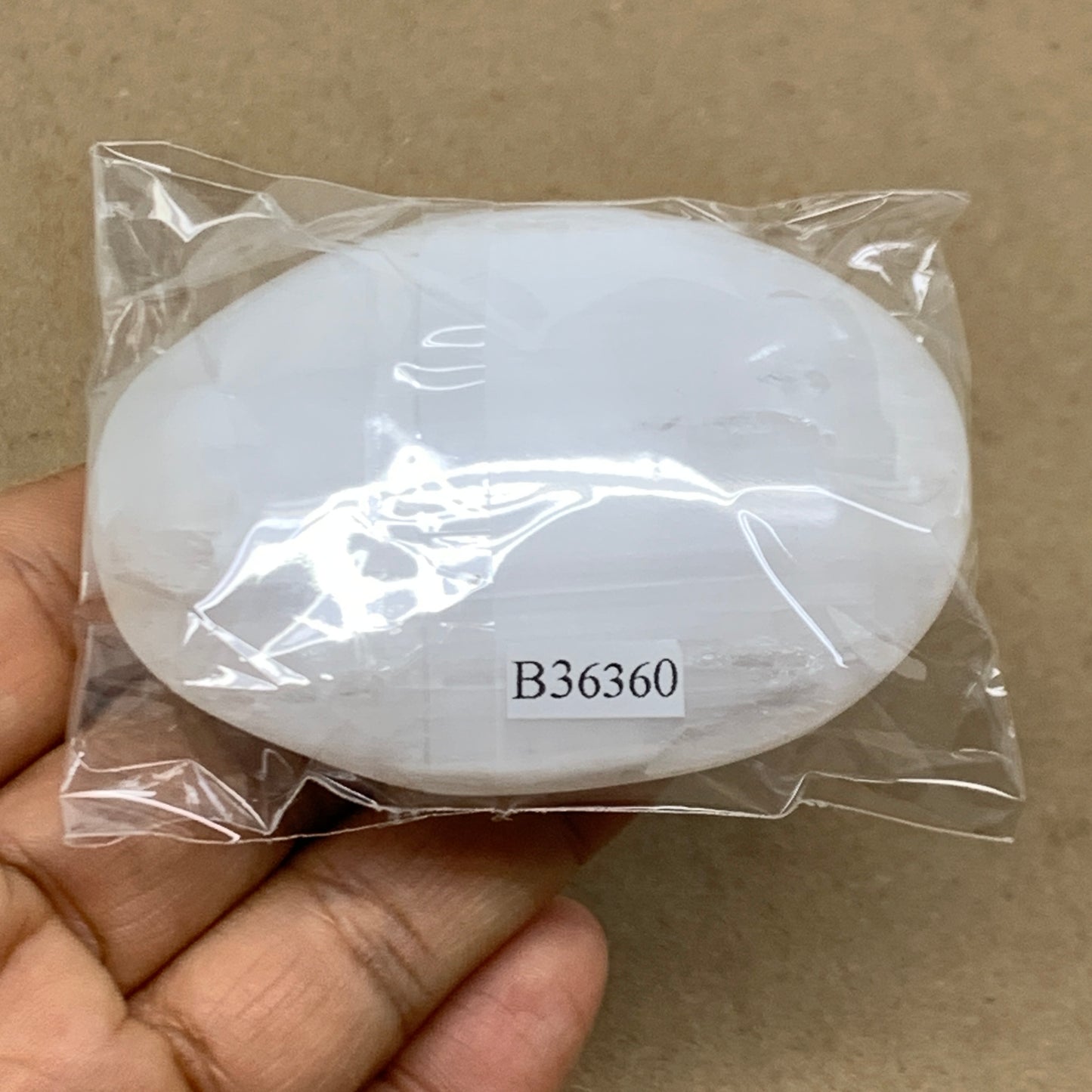 100g, 2.8"x1.9"x1", White Selenite Palmstone Crystal Pillow Reiki, B36360