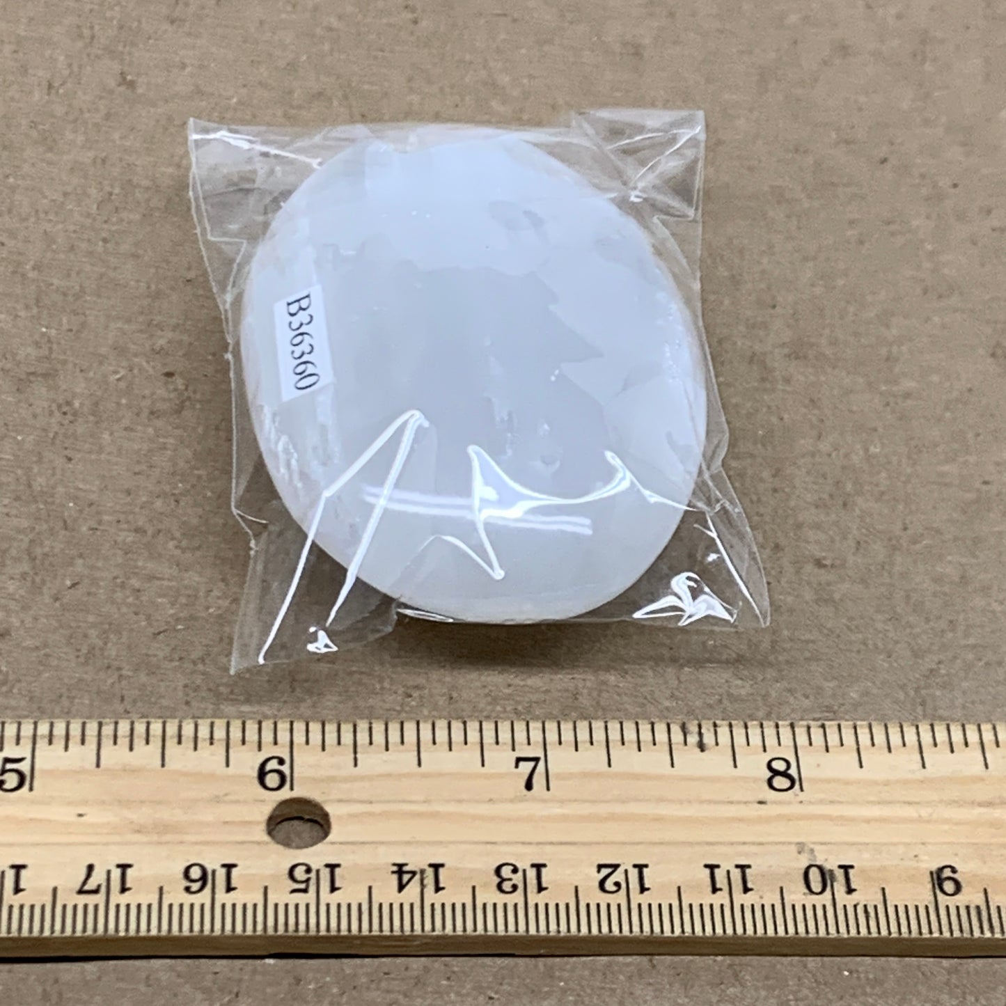 100g, 2.8"x1.9"x1", White Selenite Palmstone Crystal Pillow Reiki, B36360