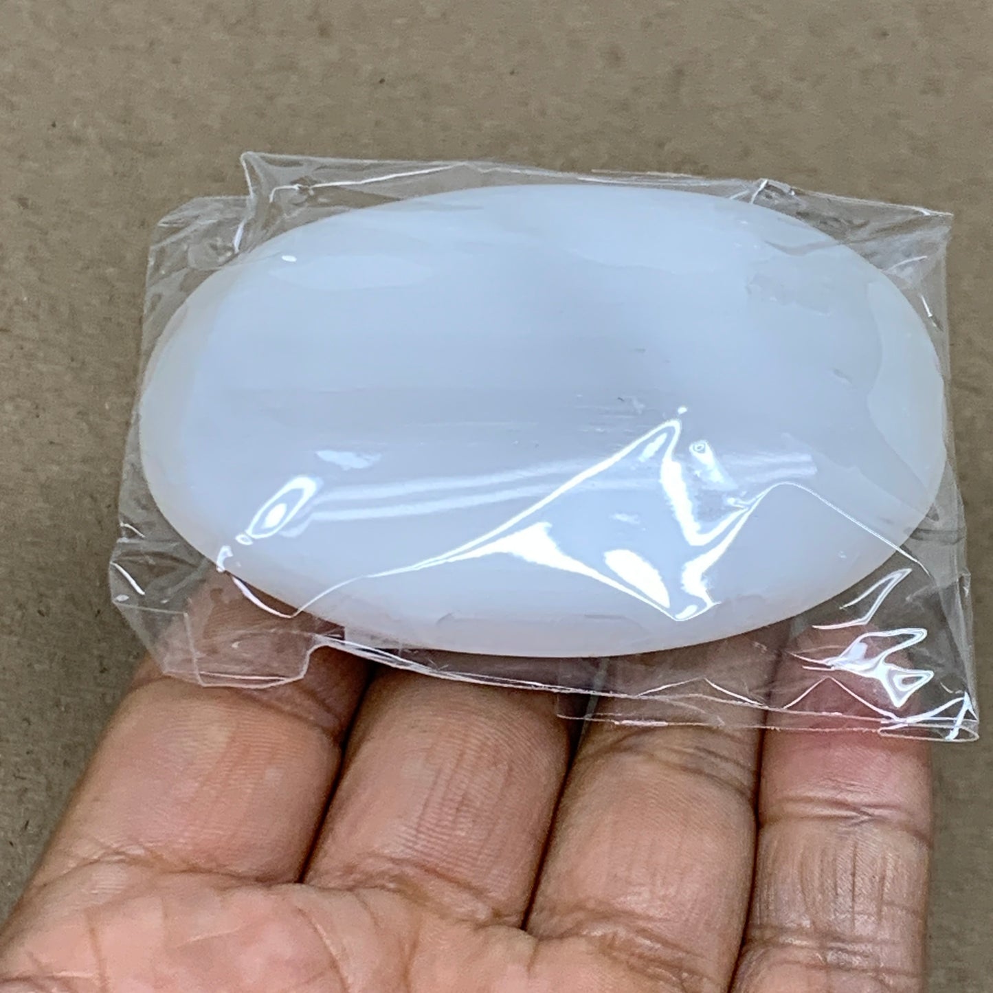 83g, 2.8"x1.9"x0.8", White Selenite Palmstone Crystal Pillow Reiki, B36362