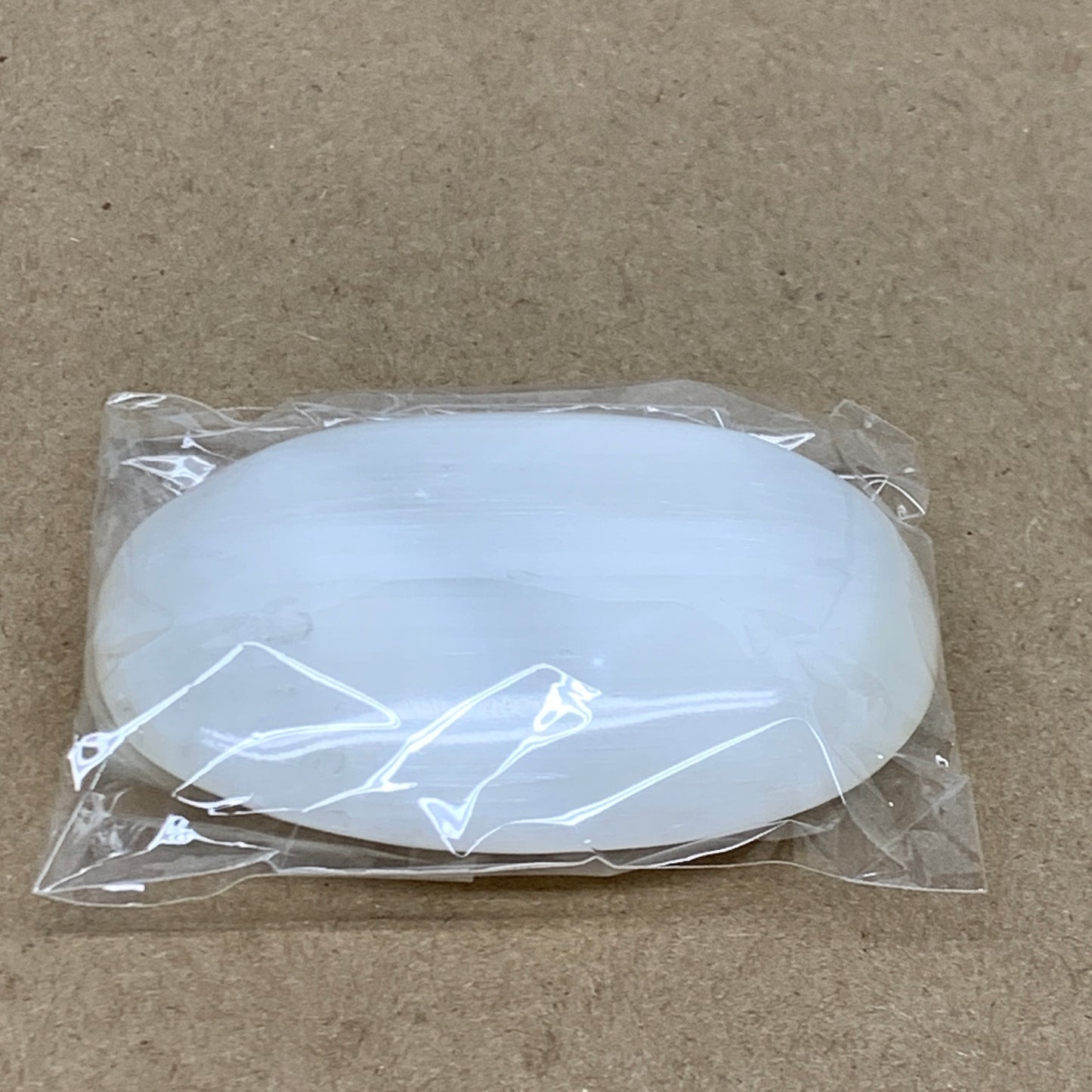 83g, 2.8"x1.9"x0.8", White Selenite Palmstone Crystal Pillow Reiki, B36362