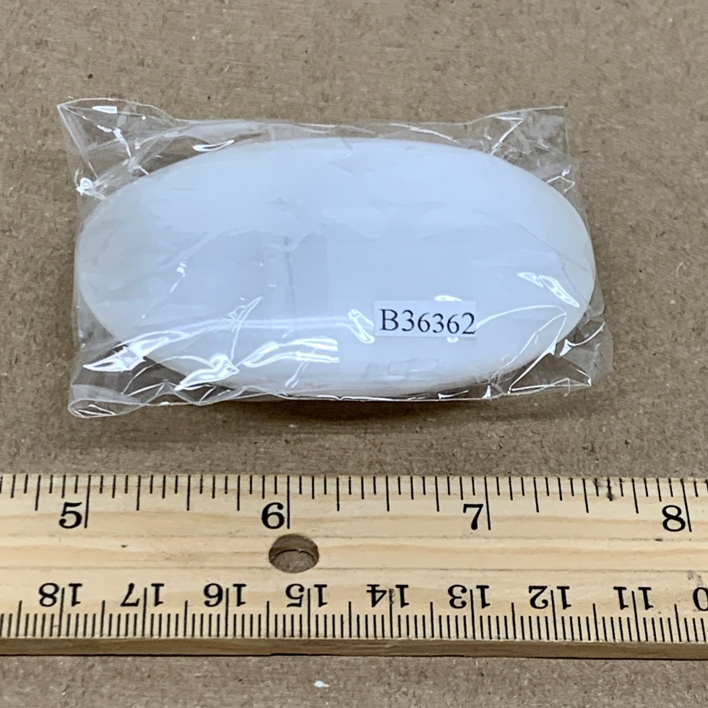 83g, 2.8"x1.9"x0.8", White Selenite Palmstone Crystal Pillow Reiki, B36362