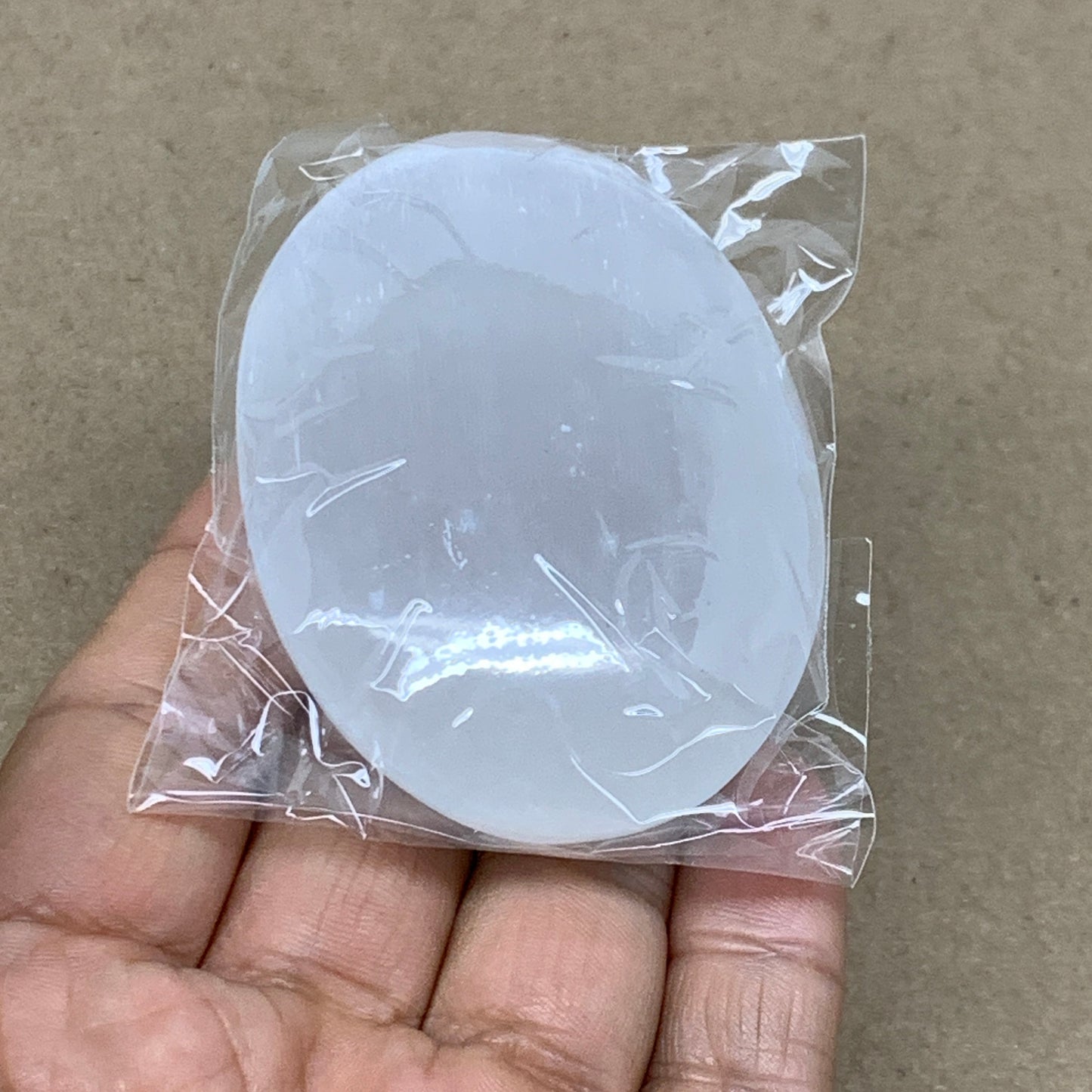 93g, 2.7"x1.9"x1", White Selenite Palmstone Crystal Pillow Reiki, B36364