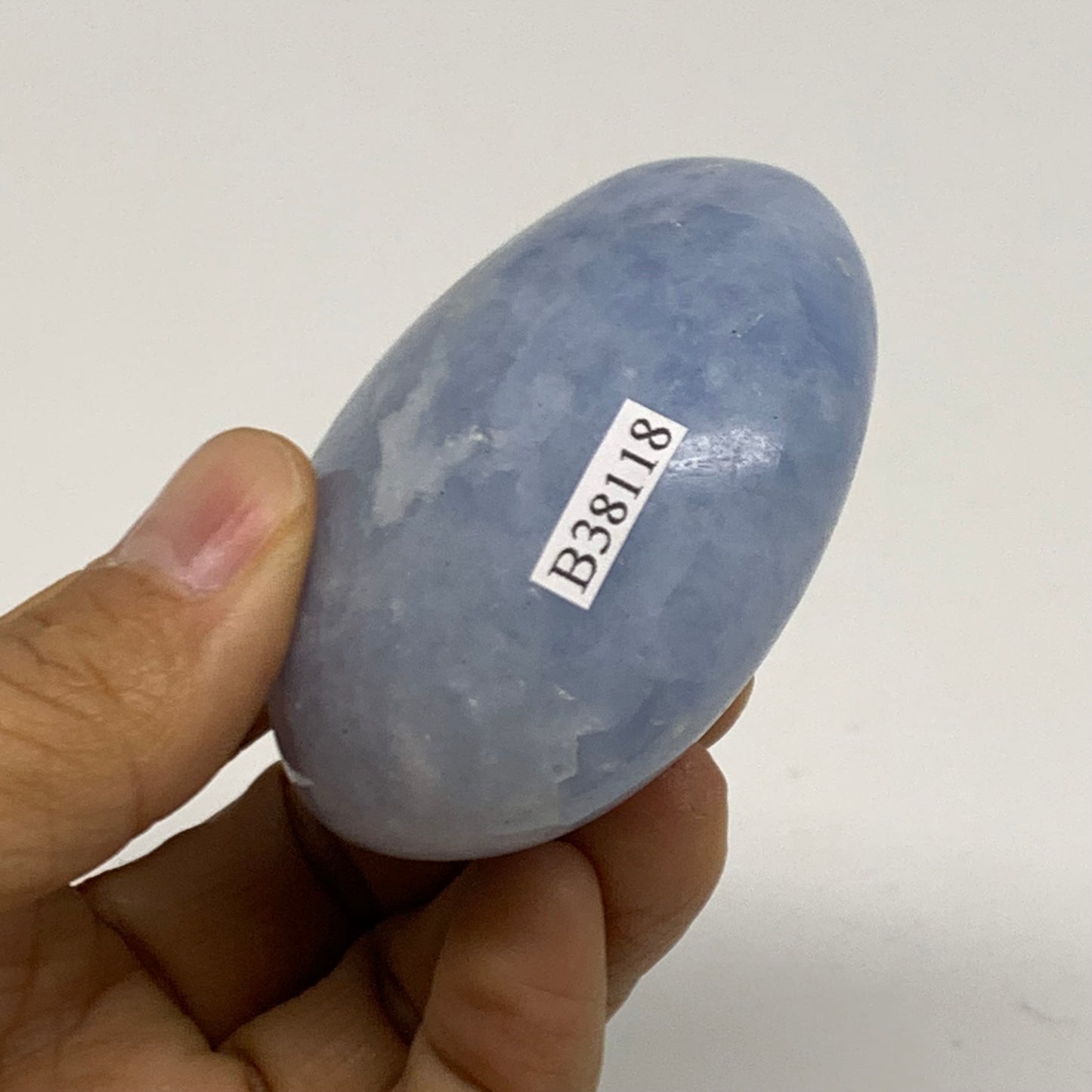 147.2g, 2.4"x2.2"x1.2" Blue Calcite Palm-Stone Polished Tumbled, B38118