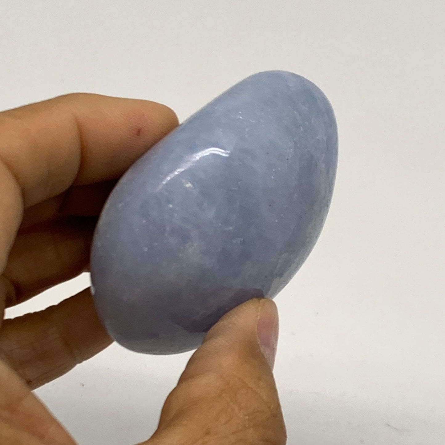 147.2g, 2.4"x2.2"x1.2" Blue Calcite Palm-Stone Polished Tumbled, B38118