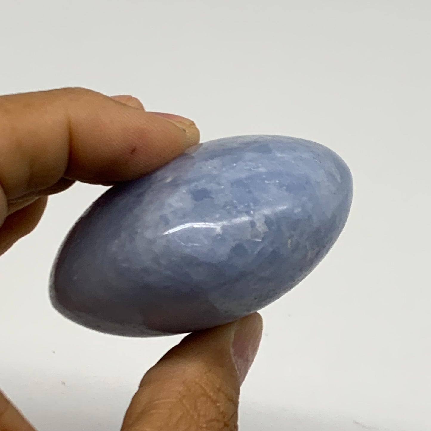 147.2g, 2.4"x2.2"x1.2" Blue Calcite Palm-Stone Polished Tumbled, B38118