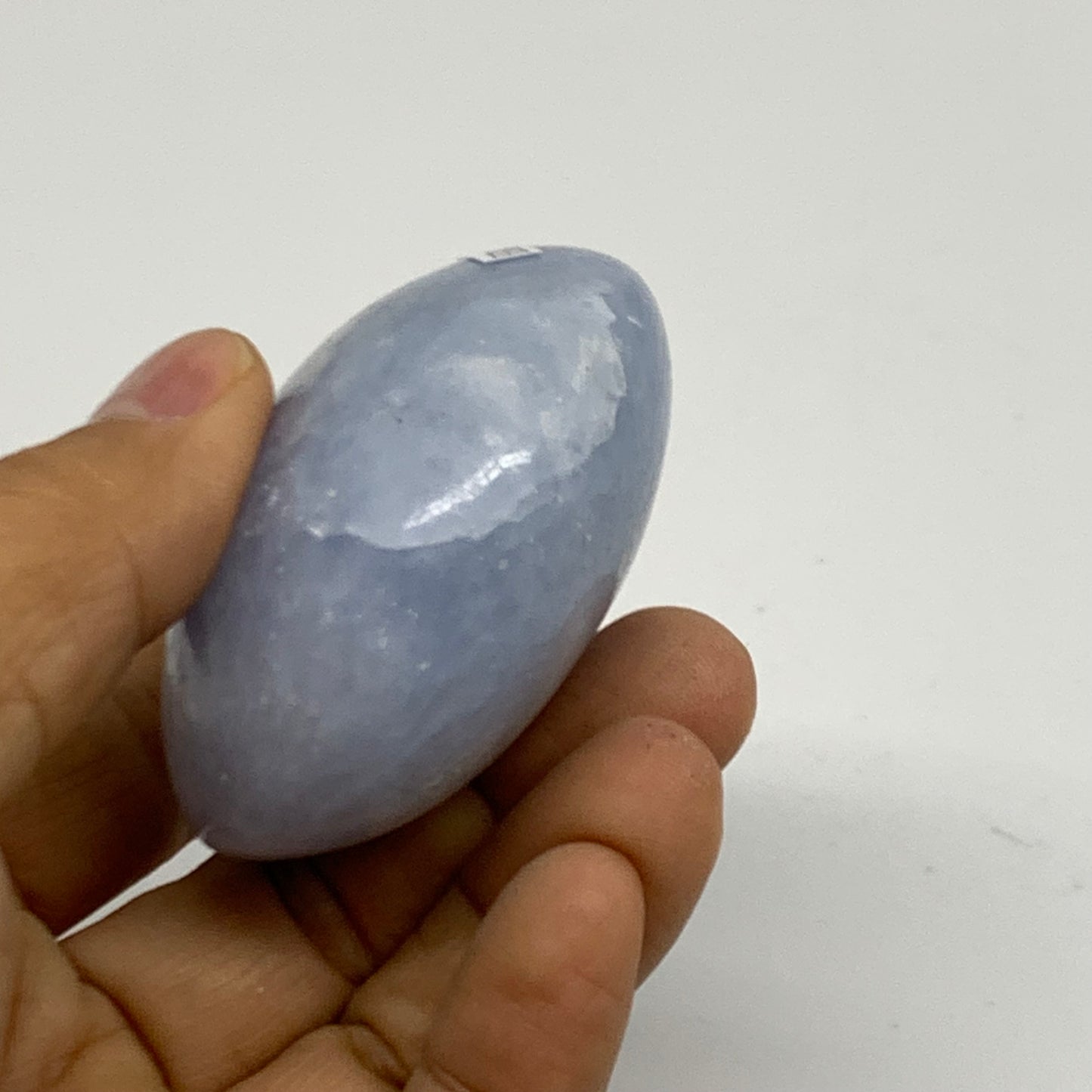 147.2g, 2.4"x2.2"x1.2" Blue Calcite Palm-Stone Polished Tumbled, B38118