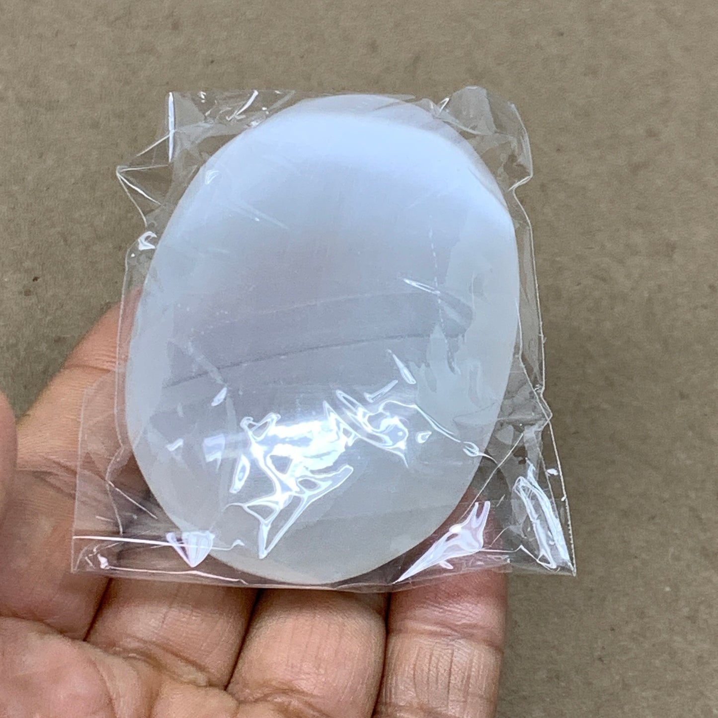 91g, 2.8"x1.9"x0.9", White Selenite Palmstone Crystal Pillow Reiki, B36366