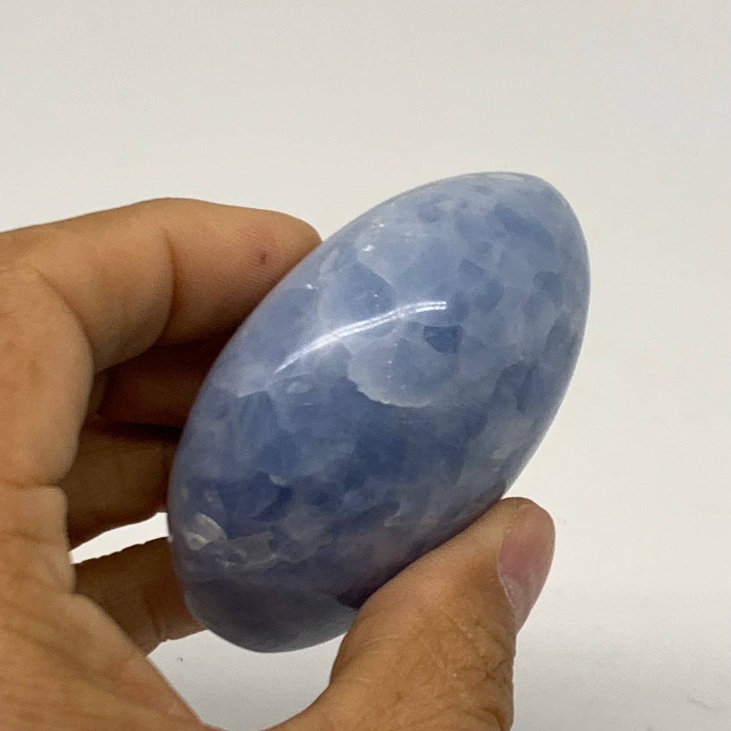 159.9g, 2.5"x2.2"x1.3" Blue Calcite Palm-Stone Polished Tumbled, B38119