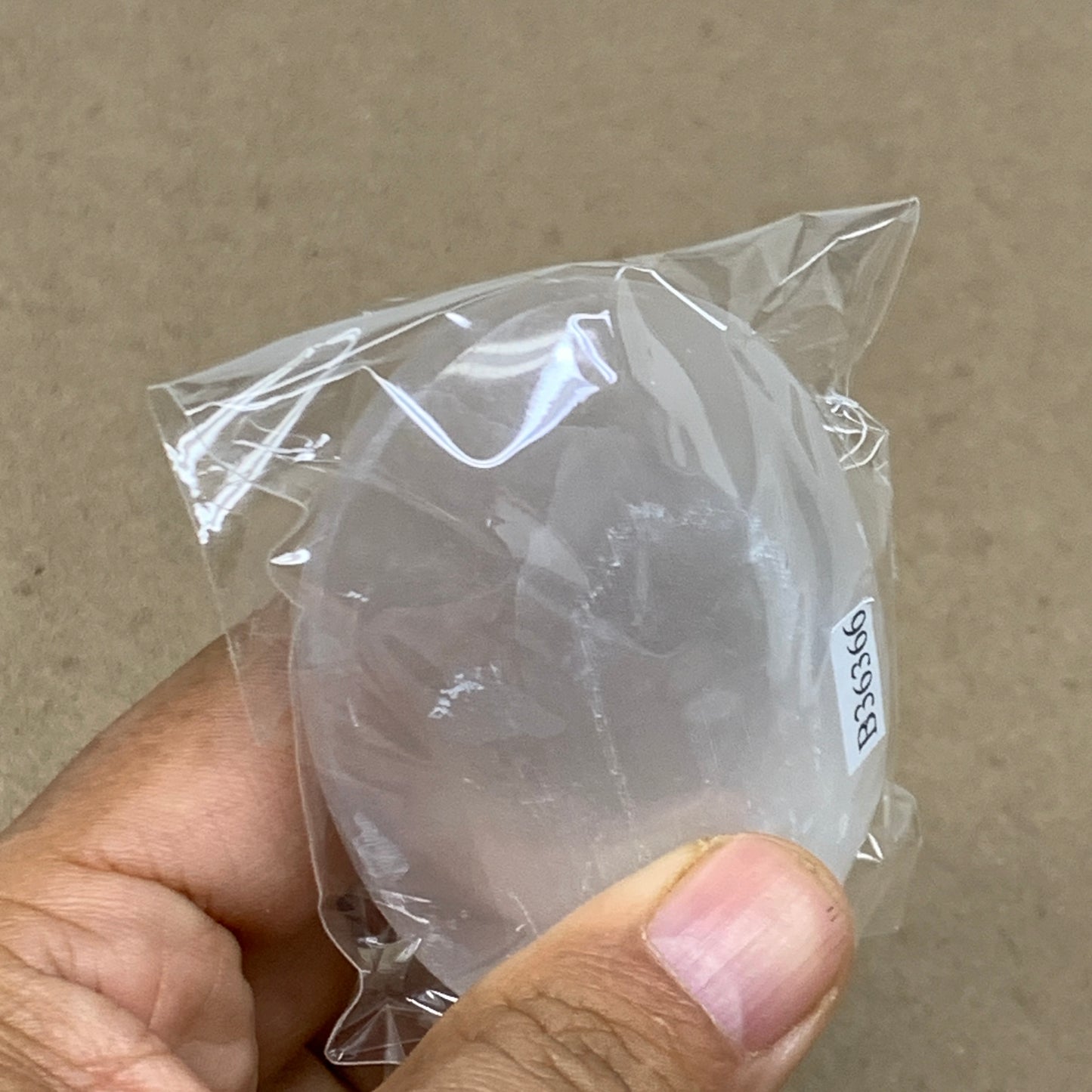 91g, 2.8"x1.9"x0.9", White Selenite Palmstone Crystal Pillow Reiki, B36366