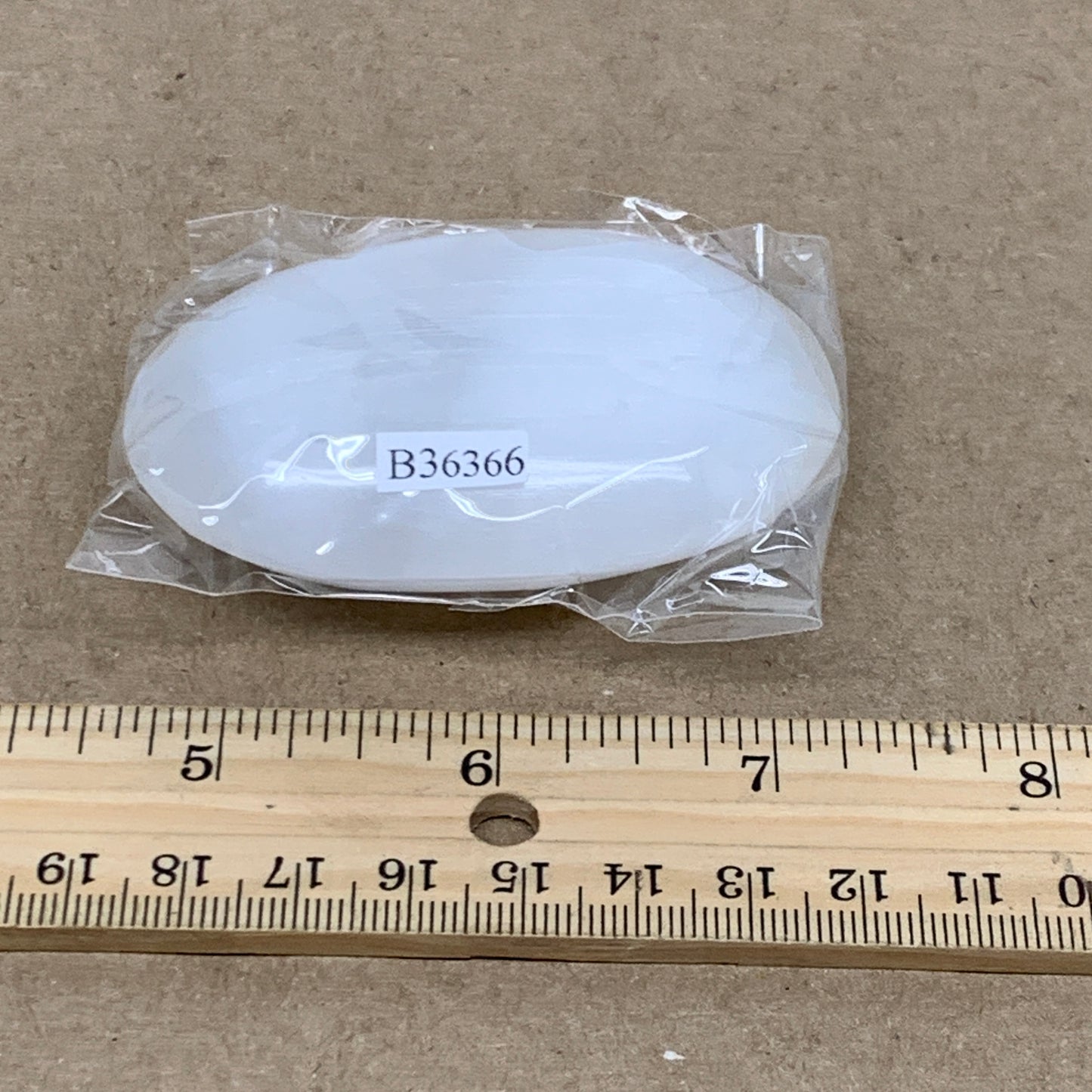 91g, 2.8"x1.9"x0.9", White Selenite Palmstone Crystal Pillow Reiki, B36366