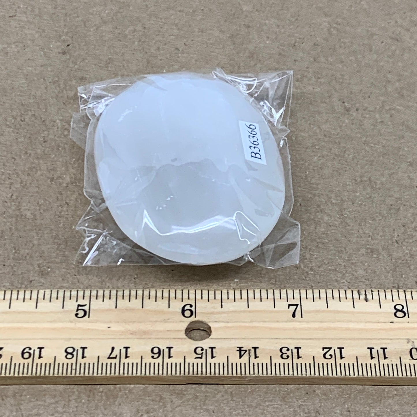 91g, 2.8"x1.9"x0.9", White Selenite Palmstone Crystal Pillow Reiki, B36366