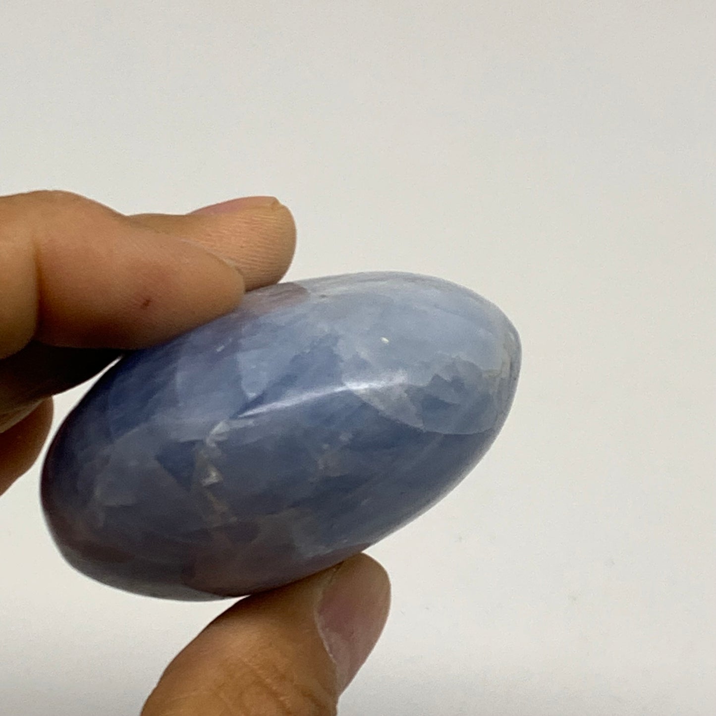144.1g, 2.5"x2.1"x1.2" Blue Calcite Palm-Stone Polished Tumbled, B38121