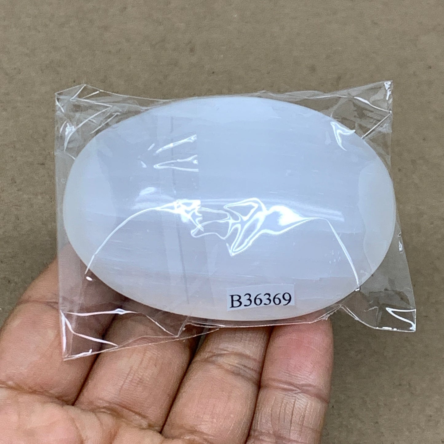 96g, 2.8"x1.8"x0.9", White Selenite Palmstone Crystal Pillow Reiki, B36369