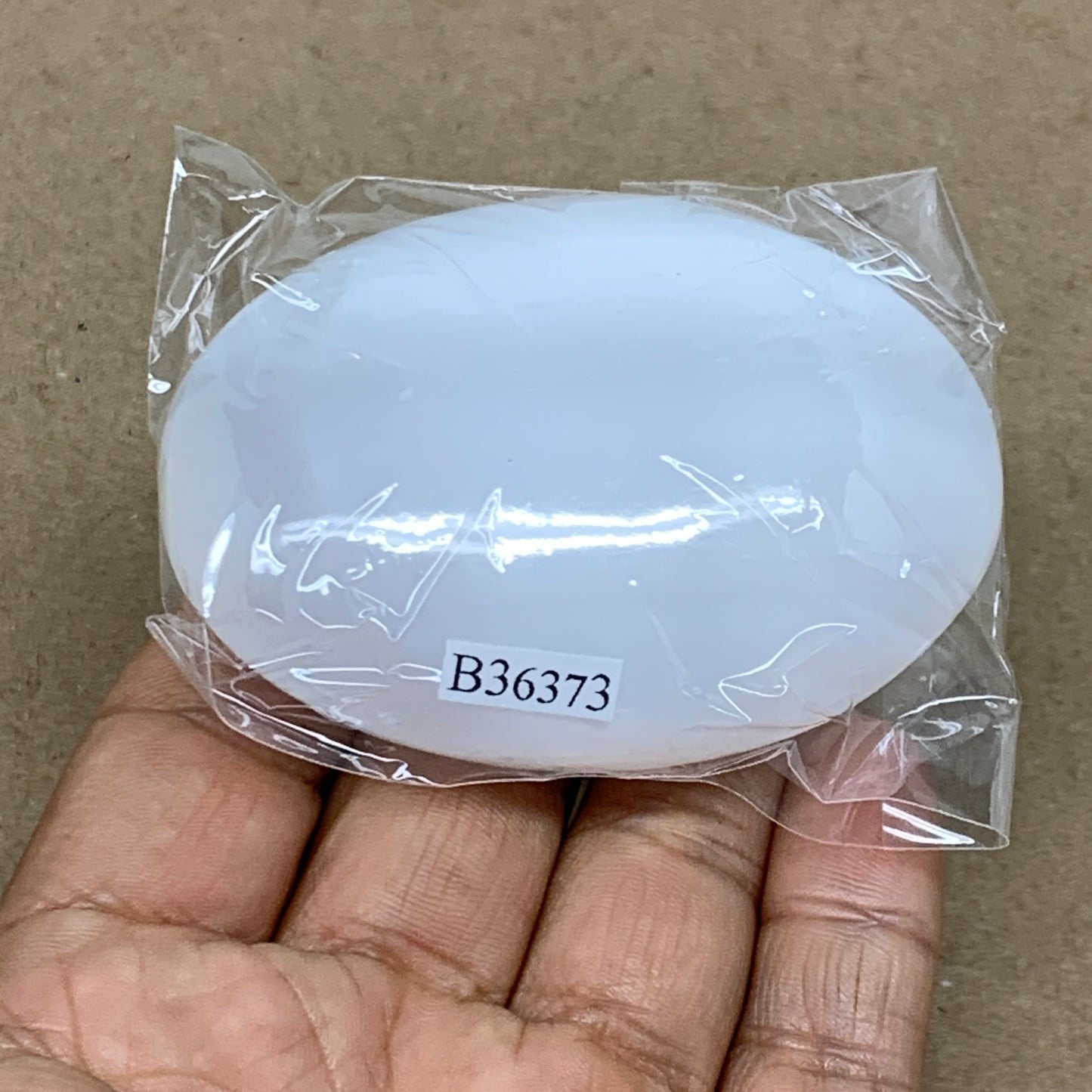 97g, 2.7"x2"x1", White Selenite Palmstone Crystal Pillow Reiki, B36373