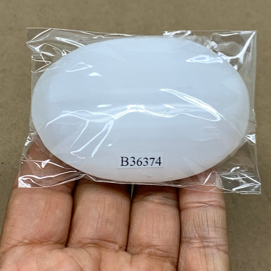 97g, 2.8"x2"x0.9", White Selenite Palmstone Crystal Pillow Reiki, B36374