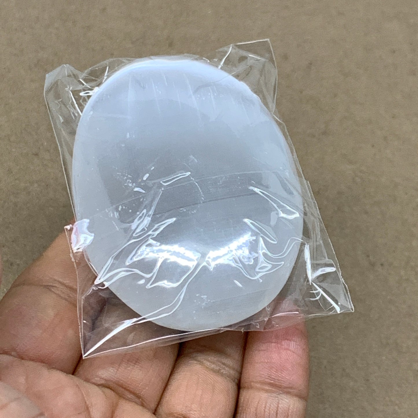 97g, 2.8"x2"x0.9", White Selenite Palmstone Crystal Pillow Reiki, B36374