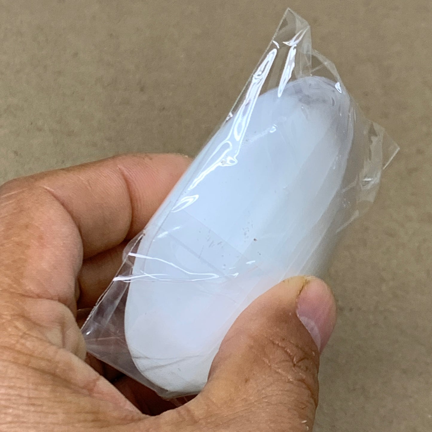 97g, 2.8"x2"x0.9", White Selenite Palmstone Crystal Pillow Reiki, B36374