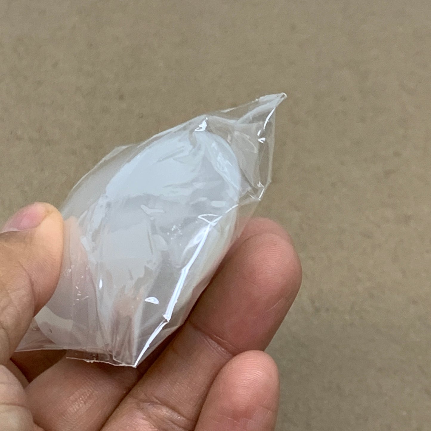 97g, 2.8"x2"x0.9", White Selenite Palmstone Crystal Pillow Reiki, B36374