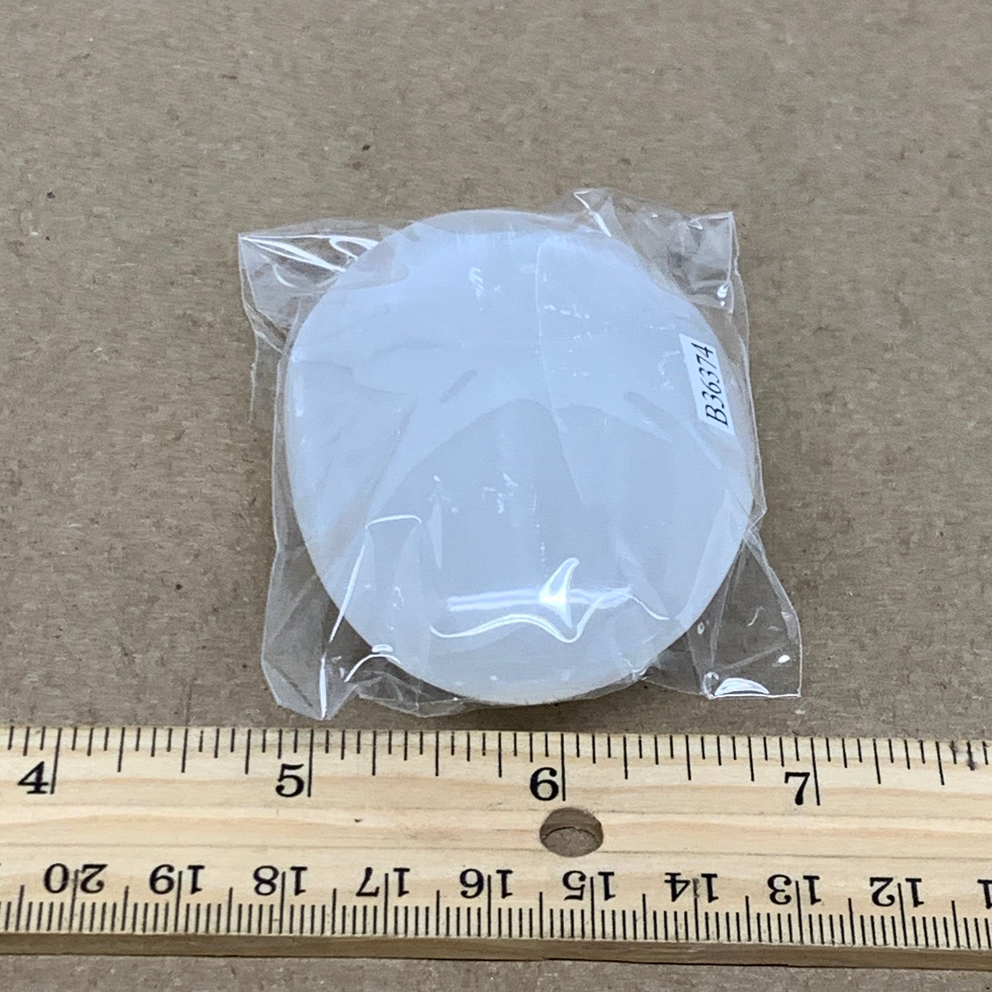 97g, 2.8"x2"x0.9", White Selenite Palmstone Crystal Pillow Reiki, B36374