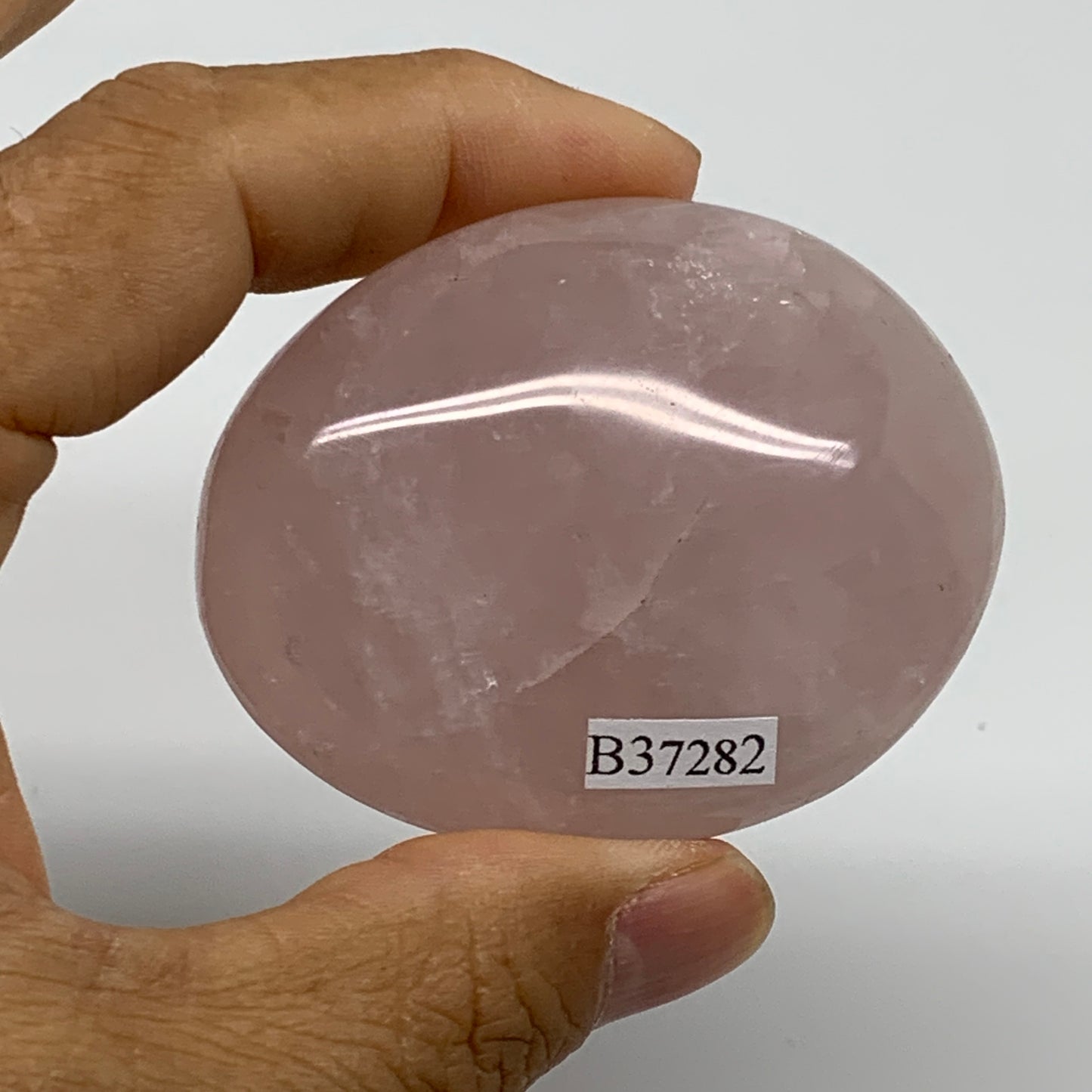 113.1g , 2.4"x1.9"x1.1", Natural Pink Rose Quartz Palm-stone Crystal, B37282