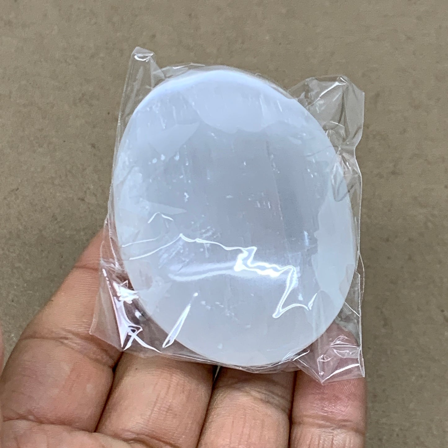 93g, 2.8"x1.9"x0.9", White Selenite Palmstone Crystal Pillow Reiki, B36376