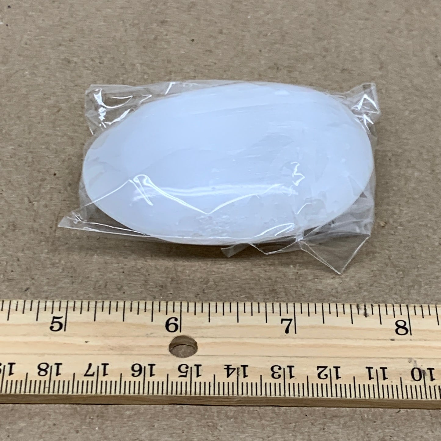 93g, 2.8"x1.9"x0.9", White Selenite Palmstone Crystal Pillow Reiki, B36376
