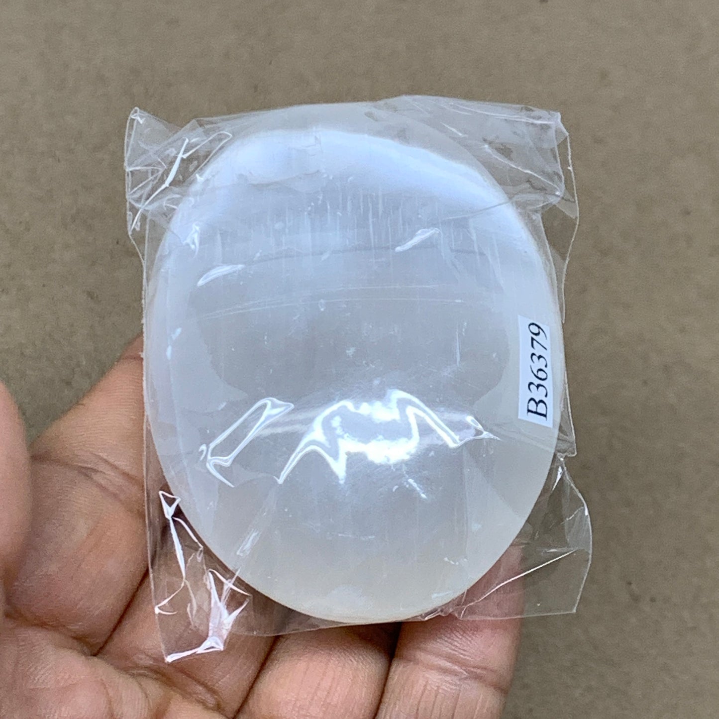 98g, 2.8"x2.1"x1", White Selenite Palmstone Crystal Pillow Reiki, B36379