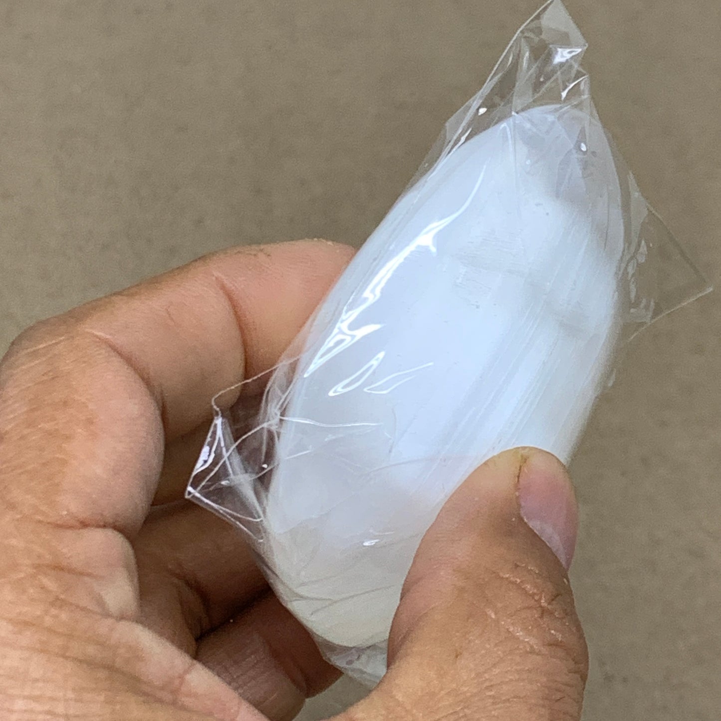 98g, 2.8"x2.1"x1", White Selenite Palmstone Crystal Pillow Reiki, B36379