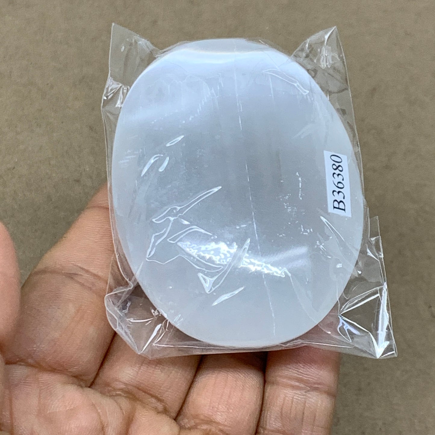 98g, 2.8"x2"x0.9", White Selenite Palmstone Crystal Pillow Reiki, B36380