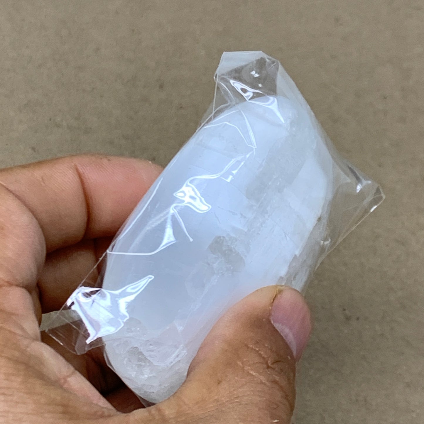 98g, 2.8"x2"x0.9", White Selenite Palmstone Crystal Pillow Reiki, B36380