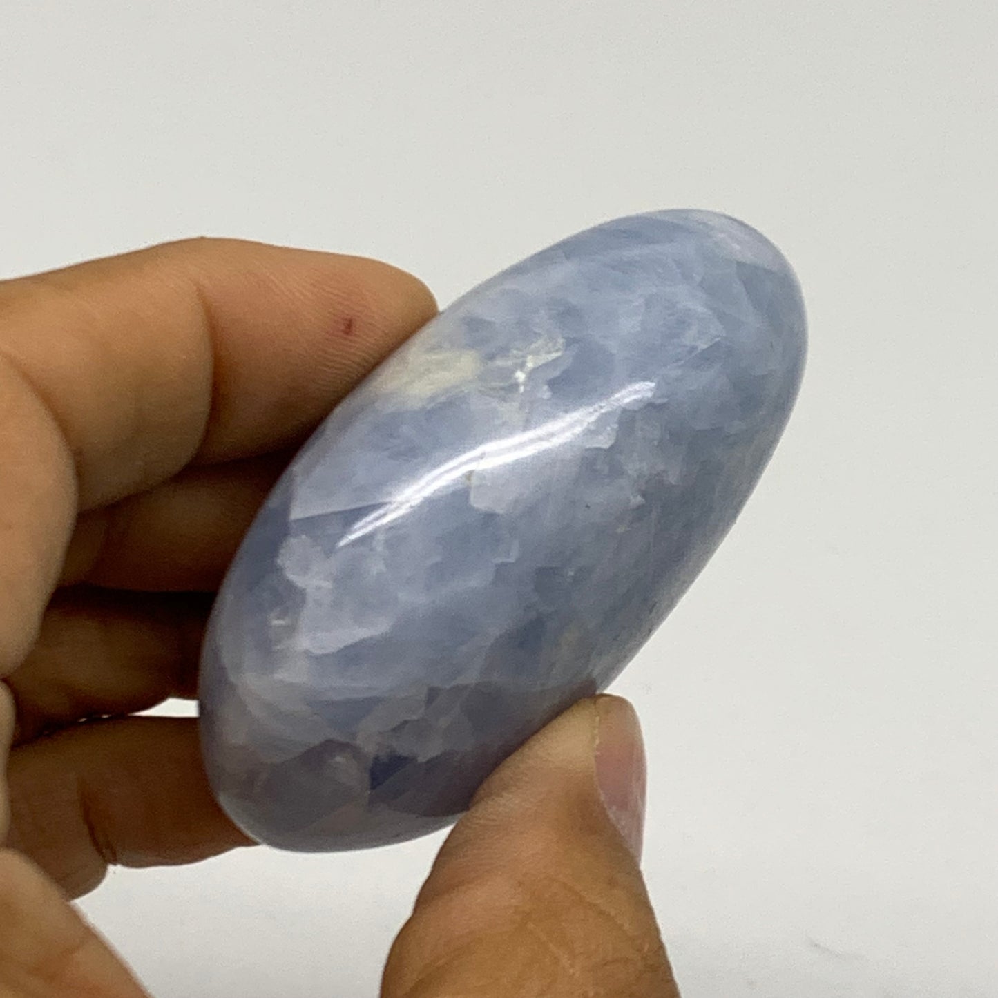 103g, 2.4"x1.7"x1" Blue Calcite Palm-Stone Polished Tumbled, B38132