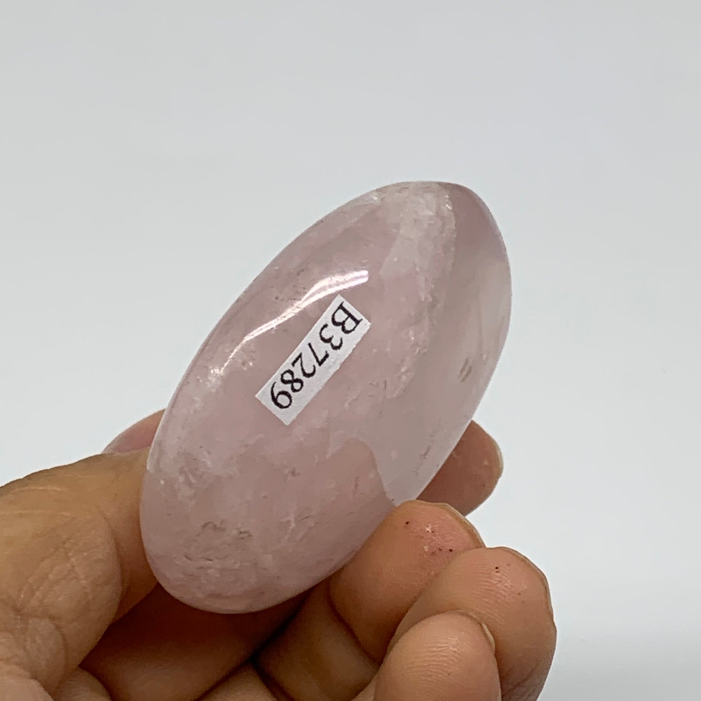 76.6g , 2.3"x1.8"x0.8", Natural Pink Rose Quartz Palm-stone Crystal, B37289