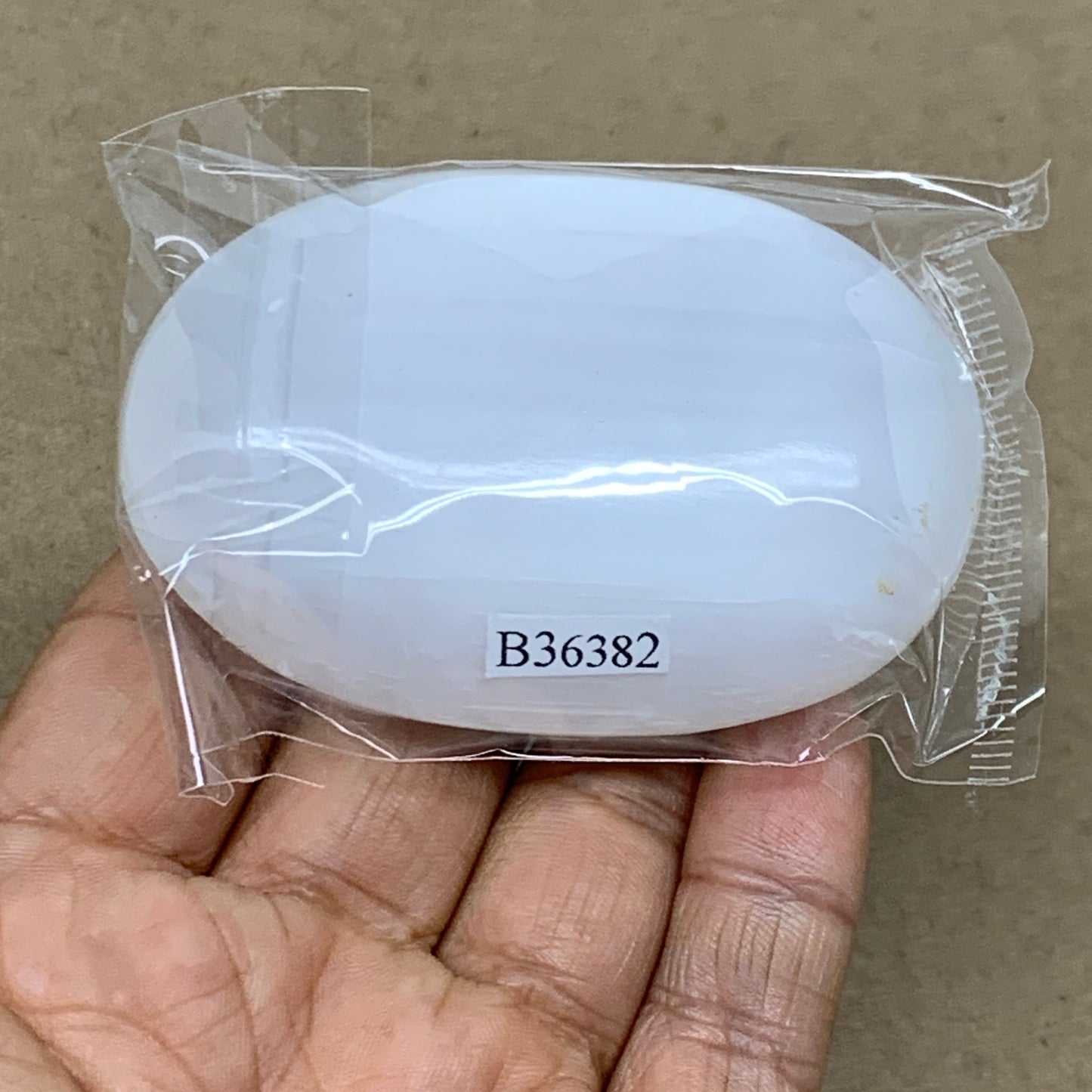 98g, 2.8"x1.9"x0.9", White Selenite Palmstone Crystal Pillow Reiki, B36382