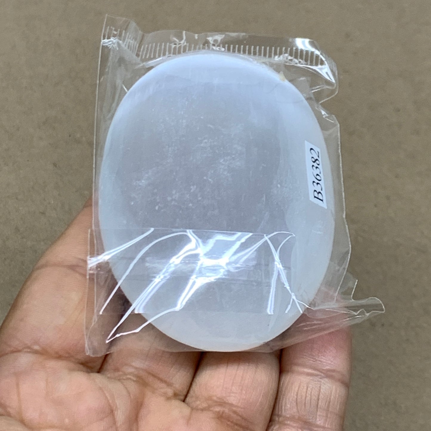 98g, 2.8"x1.9"x0.9", White Selenite Palmstone Crystal Pillow Reiki, B36382