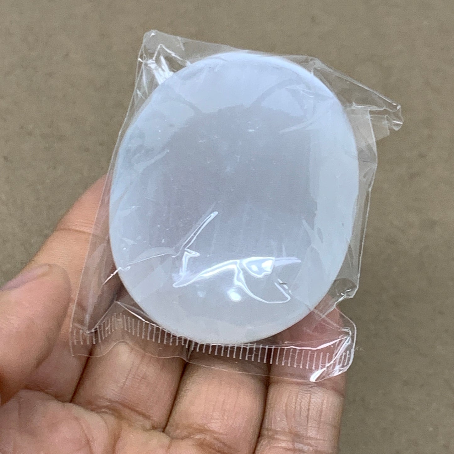 98g, 2.8"x1.9"x0.9", White Selenite Palmstone Crystal Pillow Reiki, B36382