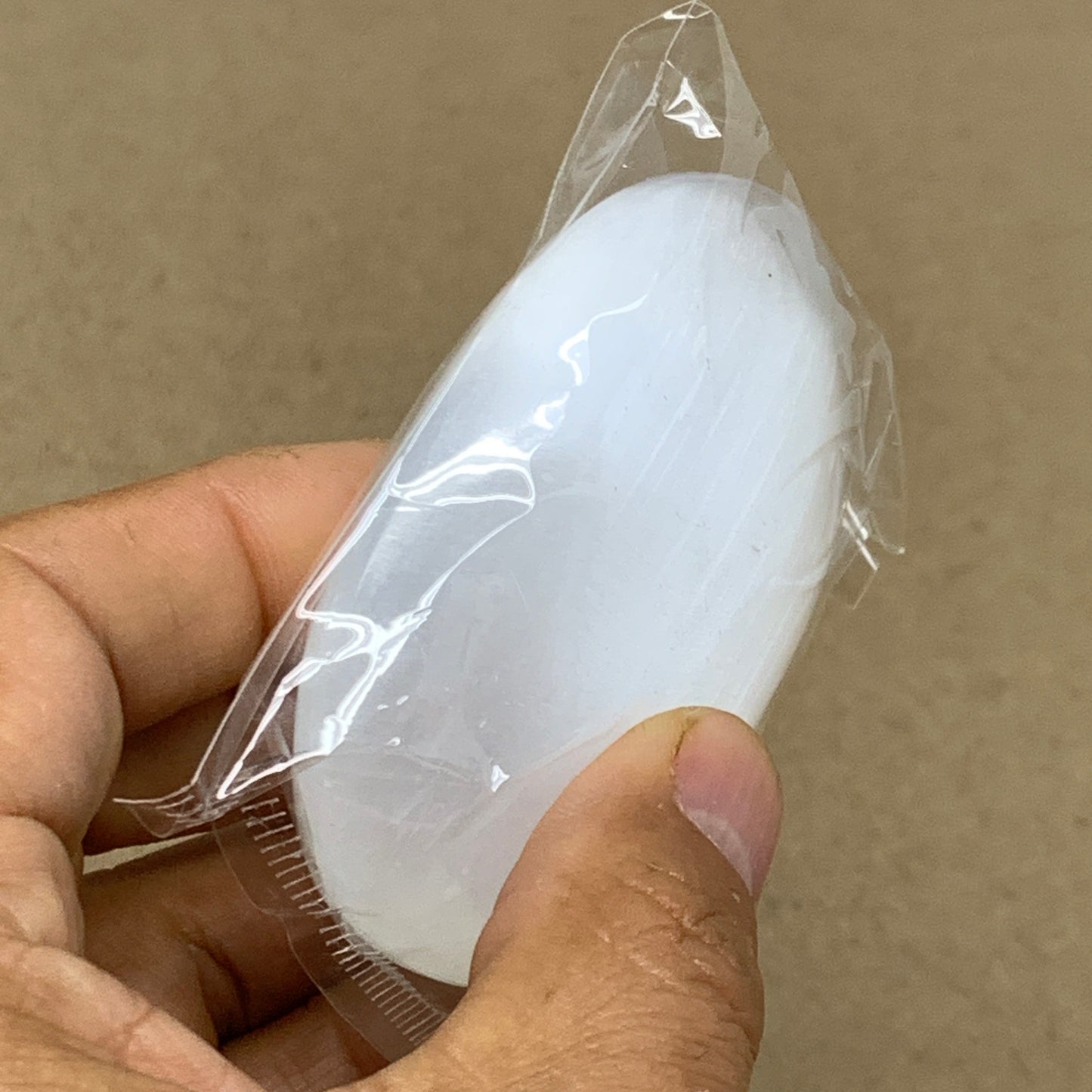 98g, 2.8"x1.9"x0.9", White Selenite Palmstone Crystal Pillow Reiki, B36382