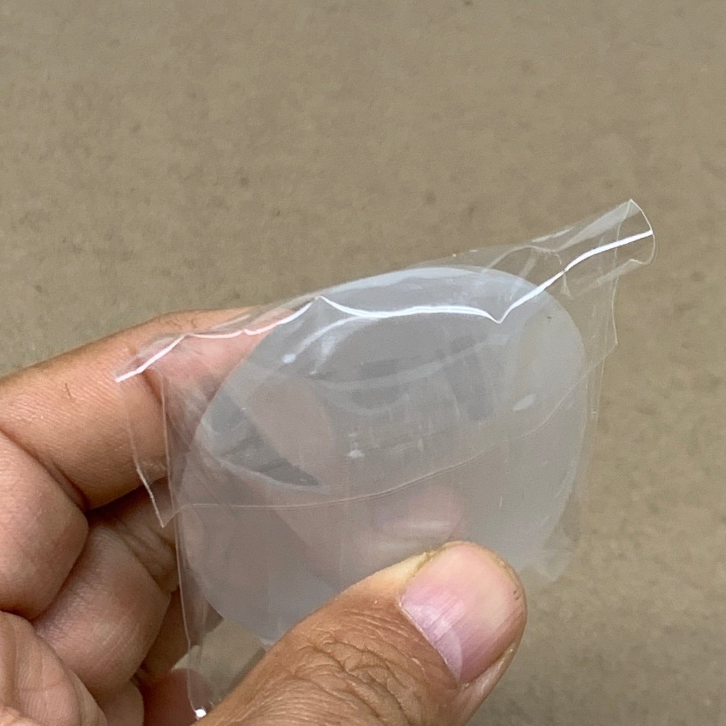 94g, 2.7"x2"x0.9", White Selenite Palmstone Crystal Pillow Reiki, B36383